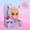 A doll in its packaging with a pastel background. Voir les images du produit