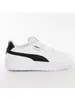 A white Puma sneaker with black accents is shown against a white background. Voir les images du produit