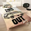 A bed with a duvet cover and pillow featuring a vintage Volkswagen bus graphic and text. Produktbild-Vorschau