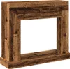 A wooden fireplace surround with an empty opening in the center, set against a white background. Podgląd zdjęcia produktu
