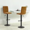 Two brown velvet bar stools are placed in front of a white counter. Anteprima dell’immagine prodotto