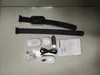 A collection of accessories for a pet camera, including straps, a charging cable, and a manual, laid out on a tiled surface. Náhled obrázku produktu