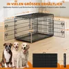 A dog cage with dimensions shown, and three dogs sitting in front of it. Produktbild-Vorschau
