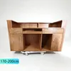 A wooden reception desk on a white background, placed on a trolley with wheels. Produktbild-Vorschau