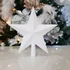 A white glitter star tree topper is displayed in front of a decorated Christmas tree. Anteprima dell’immagine prodotto