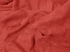 A close-up view of a crumpled red terry cloth fabric. Náhled obrázku produktu