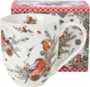 A close-up view of a large Christmas mug with a festive bird and pine branch design, placed next to its packaging. Voir les images du produit