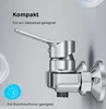 A close-up of a chrome faucet with text overlays highlighting its features. Produktbild-Vorschau