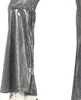 Close-up of the lower part of shiny silver bell-bottom pants, showing the flare and a white boot. Produktbild-Vorschau