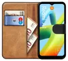 A book-style phone case for a Xiaomi Redmi A1 is shown open, revealing card slots with a bank card and euro banknotes, and the phone screen displaying the Redmi A1 interface. Produktbild-Vorschau