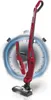 A red stick vacuum cleaner is shown in front of a clock graphic, suggesting speed or efficiency. Anteprima dell’immagine prodotto