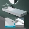 A white rectangular washbasin with a black faucet, mounted on a dark green wall. The image includes close-up insets highlighting features. Produktbild-Vorschau