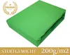 A green fitted sheet is shown on a white background, with a premium badge and text indicating fabric weight. Produktbild-Vorschau