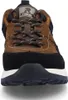 A close-up, front-facing view of a brown and black sneaker. Voir les images du produit