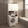 A white laundry cabinet with shelves and a washing machine in a bathroom. Náhled obrázku produktu