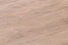 Close-up view of a wooden surface, likely a tabletop or floor, showing wood grain and texture. Produktbild-Vorschau