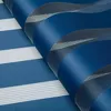 A close-up of a blue and white striped roller blind. Produktbild-Vorschau