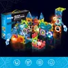 A colorful magnetic building block set with lights and tubes is displayed on a dark background, with the product box visible. Produktbild-Vorschau
