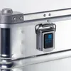 Close-up of a metal latch and part of an aluminum case. Produktbild-Vorschau