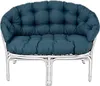 A blue cushioned rattan sofa. Produktbild-Vorschau