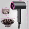 A hairdryer and its attachments are shown with dimensions indicated by measurement lines and text. Produktbild-Vorschau
