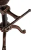 A close-up view of the base and footrest of a bronze-colored bar stool. Náhľad obrázku produktu
