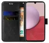 A black flip-style phone case with floral and butterfly embossing, showing credit cards and a banknote inside, and a smartphone inserted. Produktbild-Vorschau
