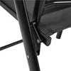 A close-up view of the hinge mechanism and fabric of a black folding chair. Produktbild-Vorschau