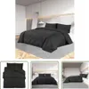 A bedroom scene with a bed dressed in black bedding, and smaller inset images showing the bedding folded and on a bed. Produktbild-Vorschau