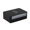 A black multi-port USB charger with a wireless charging pad on top. Produktbild-Vorschau