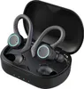 A pair of black wireless earbuds with blue glowing rings are placed inside their black charging case, which is open. Produktbild-Vorschau
