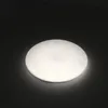 A round, white ceiling light with a glitter effect is shown against a dark background. Produktbild-Vorschau
