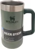 A green Stanley beer stein with a silver rim and handle, shown against a white background. Voir les images du produit