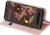 A pink flip case for a Google Pixel 7a, shown at an angle with the phone screen displaying widgets. Produktbild-Vorschau