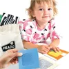 A baby is playing with a Montessori puzzle set. Podgląd zdjęcia produktu