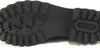 The sole of a black boot is shown in close-up. Anteprima dell’immagine prodotto