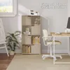 A home office or study area with a bookshelf, desk, and chair. Produktbild-Vorschau