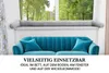 A grey bolster pillow is placed on a windowsill above a teal sofa with two teal cushions. Produktbild-Vorschau