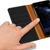 A hand is shown interacting with a phone case. Náhľad obrázku produktu