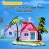 A model of the Kame House from Dragon Ball, built with toy bricks, situated on a small island with palm trees. Produktbild-Vorschau