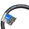 A close-up of a bicycle tire with its packaging. Produktbild-Vorschau