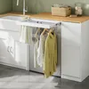 Detail der ausziehbaren Wäschentrockner-Funktion des SoBuy Unterschranks BZR223-WN mit Kleidungsstücken Productafbeelding-voorbeeld