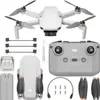 A flat lay of a drone and its accessories, including a remote control, batteries, propellers, and cables, arranged on a white background. Náhled obrázku produktu