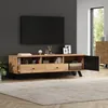 A modern living room with a TV stand and a large TV mounted on the wall. Náhľad obrázku produktu