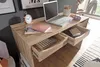 A desk with a laptop, clock, and open drawers, suggesting a home office or study environment. Anteprima dell’immagine prodotto