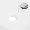 A white ceramic sink with a chrome drain cover inset in the top right corner. Náhled obrázku produktu