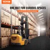 A forklift in a warehouse with shelves of boxes. Podgląd zdjęcia produktu