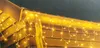 Icicle lights are installed on the gutter of a wooden house. Produktbild-Vorschau