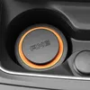 A close-up view of an Axe car air freshener placed in a car's cup holder. Anteprima dell’immagine prodotto