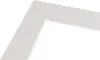 A close-up view of a white picture frame mat with a textured surface. Produktbild-Vorschau